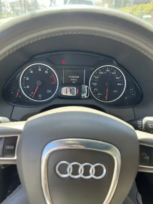 Audi Just Programmed Remote Head Key On Truck Armrest Pad - EZ Car Keyz Concha Loma, Carpinteria