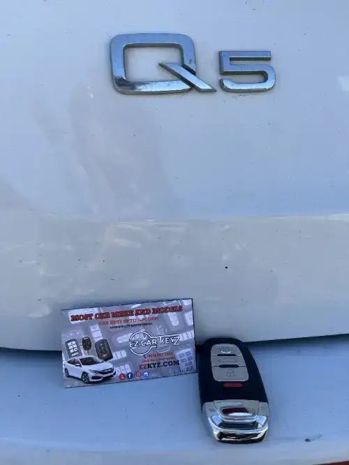Audi Q5 Freshly Made Key Fob On Luxury Car Armrest - EZ Car Keyz Oak Park, Oak Park