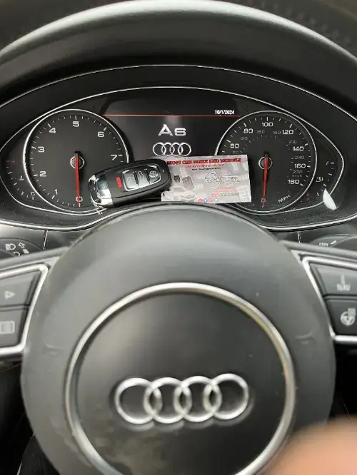 Audi Smart Key On Family Car Door Panel - EZ Car Keyz Border Area, San Ysidro