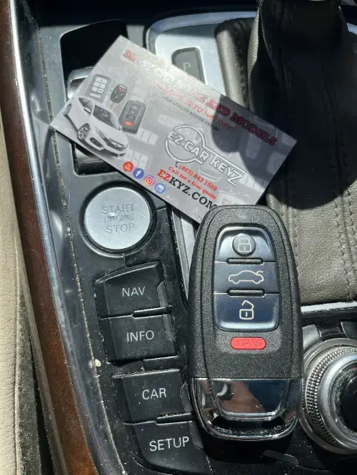 Audi Transponder Key On Compact Car Center Console Surface - EZ Car Keyz La Costa, Carlsbad