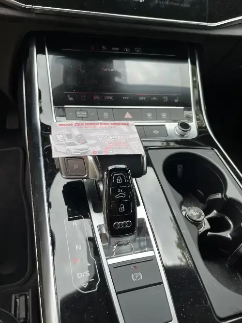 Audi Transponder Key On Sedan Armrest Surface - EZ Car Keyz Lang Ranch, Thousand Oaks