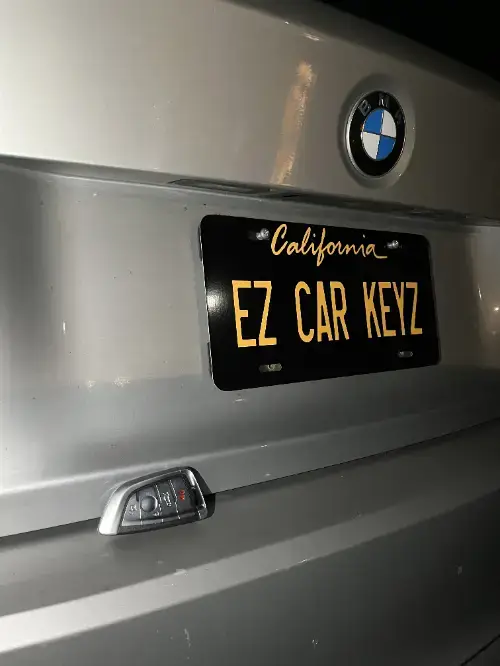 Bmw Freshly Made Smart Key On Sports Car Center Console - EZ Car Keyz Aviara, Carlsbad
