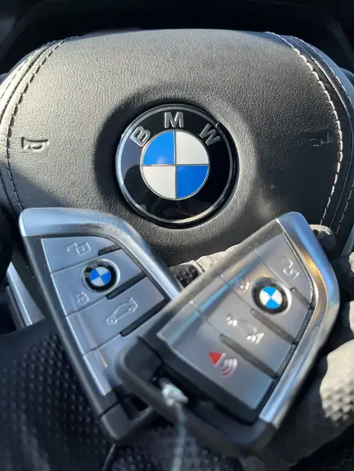 Bmw Push To Start Key Fob On Sports Car Seat Bolster - EZ Car Keyz Five Points, Oxnard