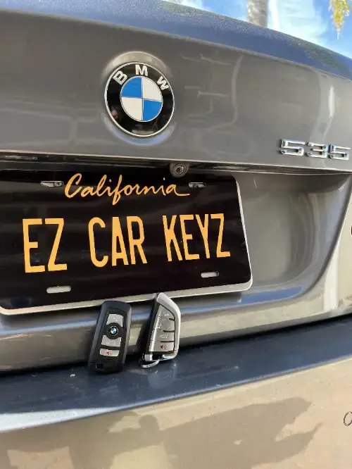 Bmw Remote Head Key On Family Car Cup Holder - EZ Car Keyz CSUSM Area, San Marcos