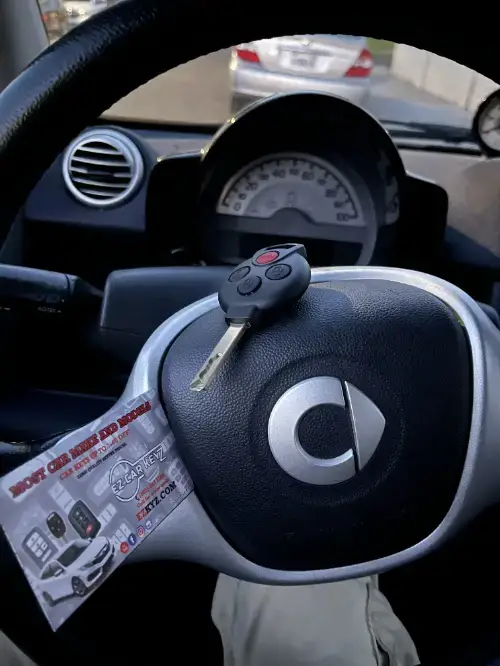 Bmw Smart Key On Truck Dashboard Surface - EZ Car Keyz Via Real Corridor, Carpinteria