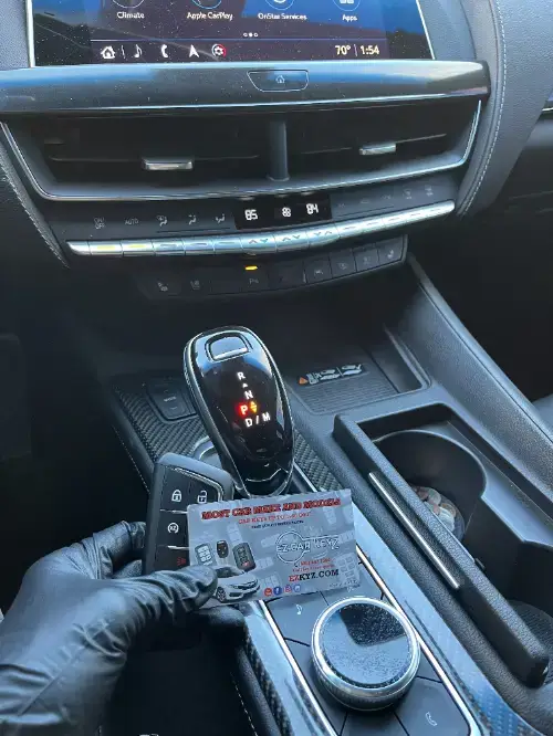 Cadillac Smart Key On Leather Steering Wheel - EZ Car Keyz Blackstock, Oxnard