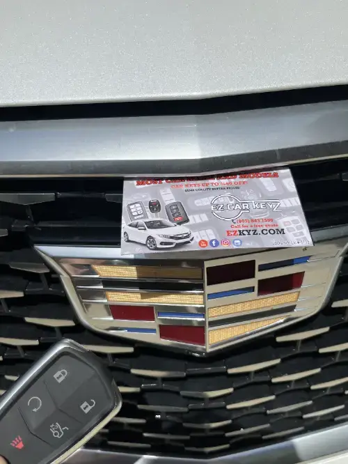 Cadillac Transponder Key On Compact Car Steering Wheel - EZ Car Keyz Concha Loma, Carpinteria