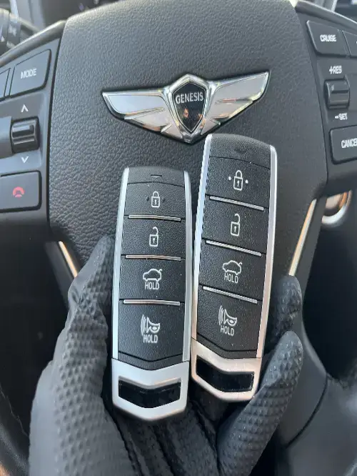 Genesis Key Fob On Compact Car Armrest Surface - EZ Car Keyz Alpine Village, Alpine