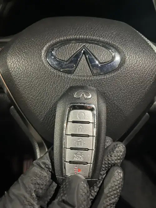 Infiniti Flip Key Replacement On Sedan Dashboard Speaker Cover - EZ Car Keyz Alpine Village, Alpine