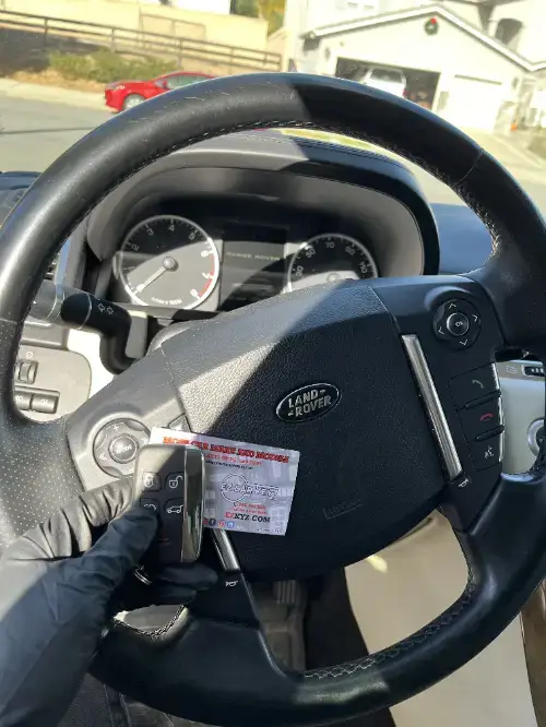 Land Rover Remote Head Key On Sports Car Steering Wheel - EZ Car Keyz Simi Hills, Simi Valley