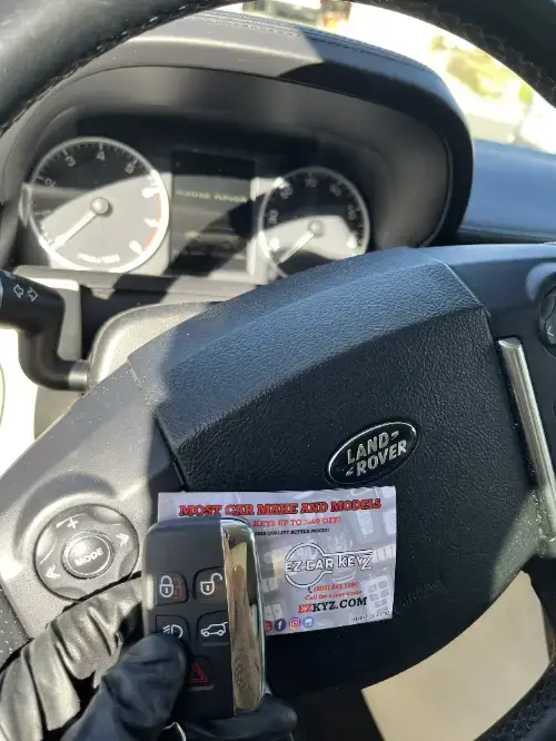 Land Rover Transponder Key On Family Car Armrest Console - EZ Car Keyz Blackstock, Oxnard