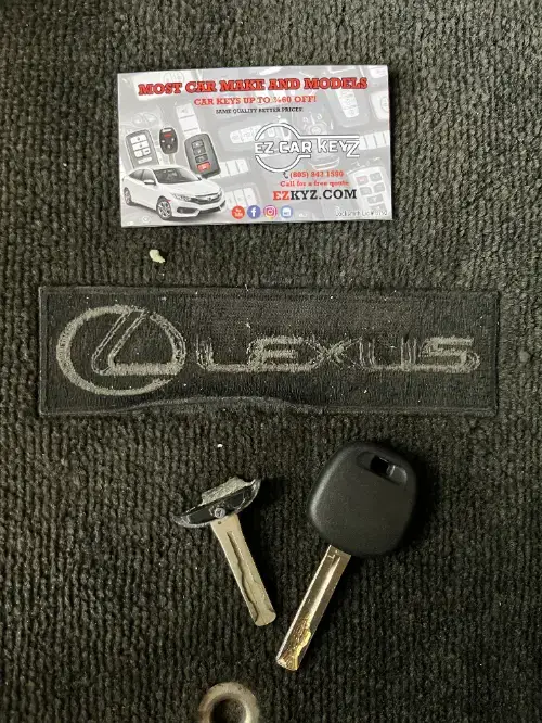 Lexus Smart Key Fob On Sports Car Steering Wheel - EZ Car Keyz Hollywood Beach, Oxnard
