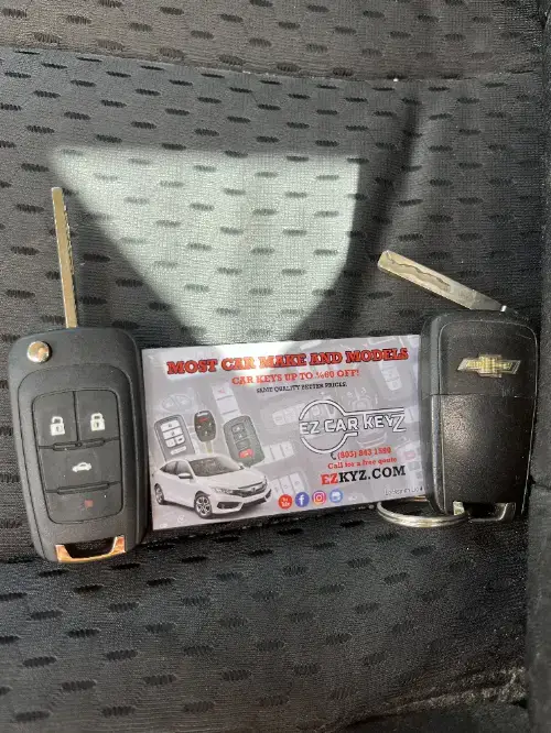 Mazda Freshly Made Spare Flip Key On Suv Dashboard - EZ Car Keyz Windsor North/River Ridge, Oxnard