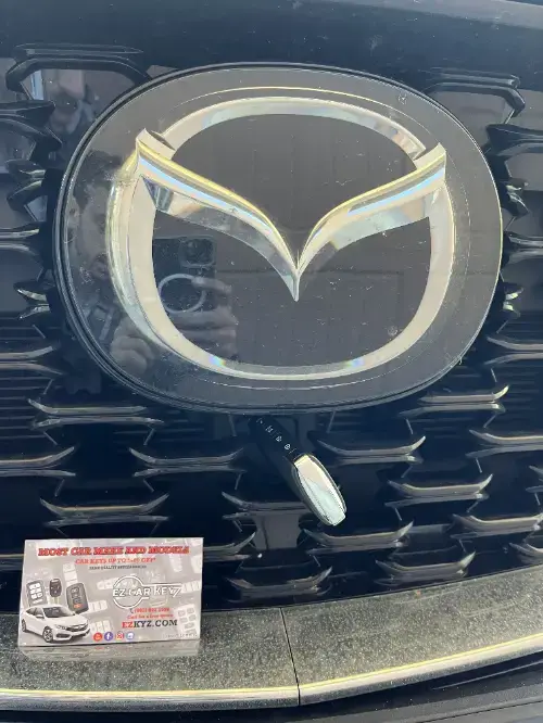 Mazda Just Programmed Push To Start Key On Sedan Door Panel - EZ Car Keyz Upper Village, Montecito