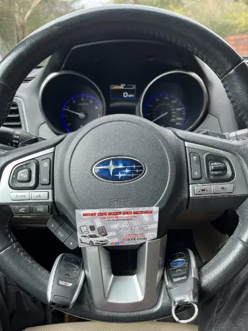 Subaru Smart Key Fob On Sedan Leather Driver Seat - EZ Car Keyz Peutz Valley, Alpine