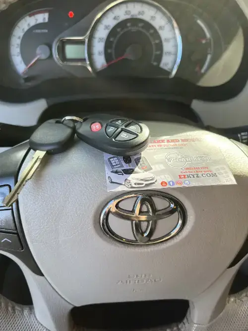 Toyota Push To Start Key On Sedan Armrest Leather Surface - EZ Car Keyz Hollywood Beach, Oxnard