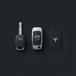 Subaru Outback, Volvo, and Tesla keys - the Ojai Valley daily driver mix