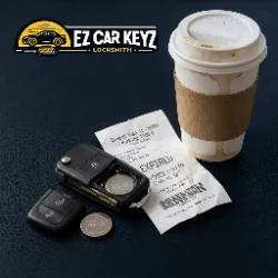 Dead key fob with a parking receipt and coffee at the Oxnard Transit Center