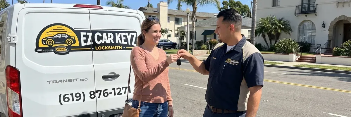 EZ Car Keyz locksmith with satisfied customer in Vista