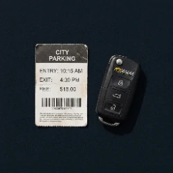Ventura parking structure ticket with a flip key at a downtown garage