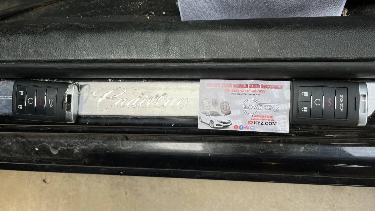 Insured mobile locksmith working on 2013 Cadillac ATS in Vista CA