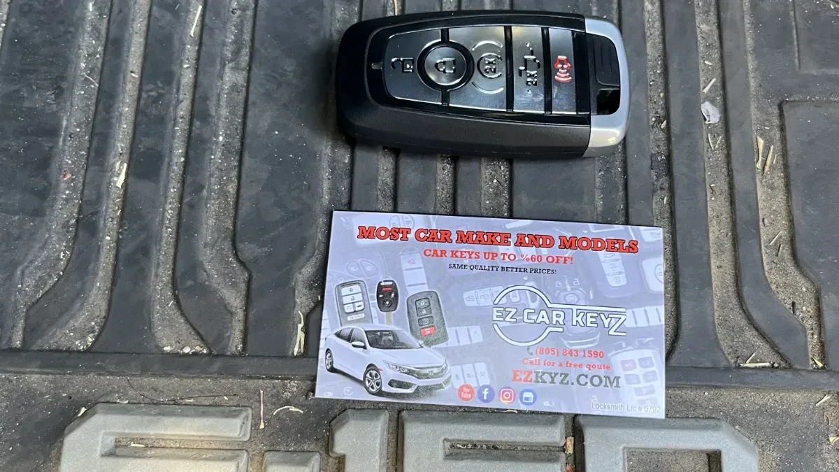Insured mobile locksmith working on 2013 Ford Escape in Rancho Santa Fe CA