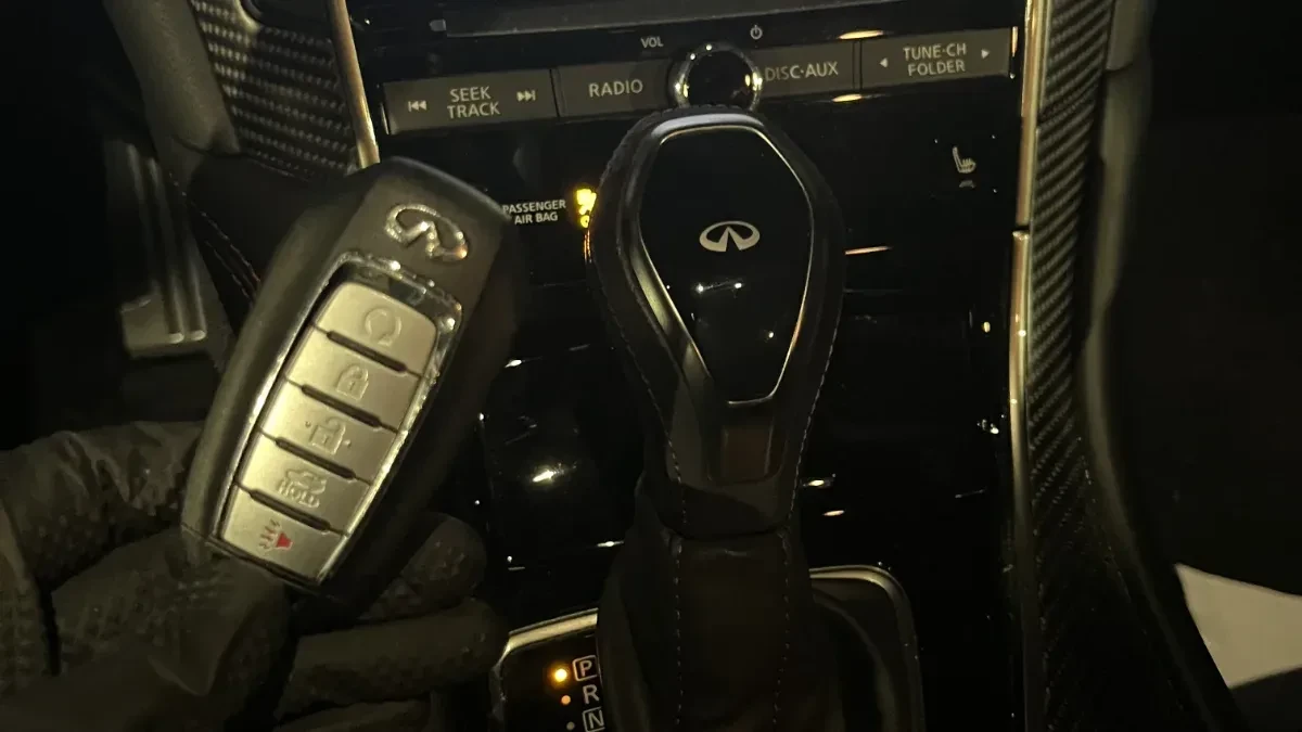 Insured mobile locksmith working on 2002 Infiniti QX4 in San Marcos CA