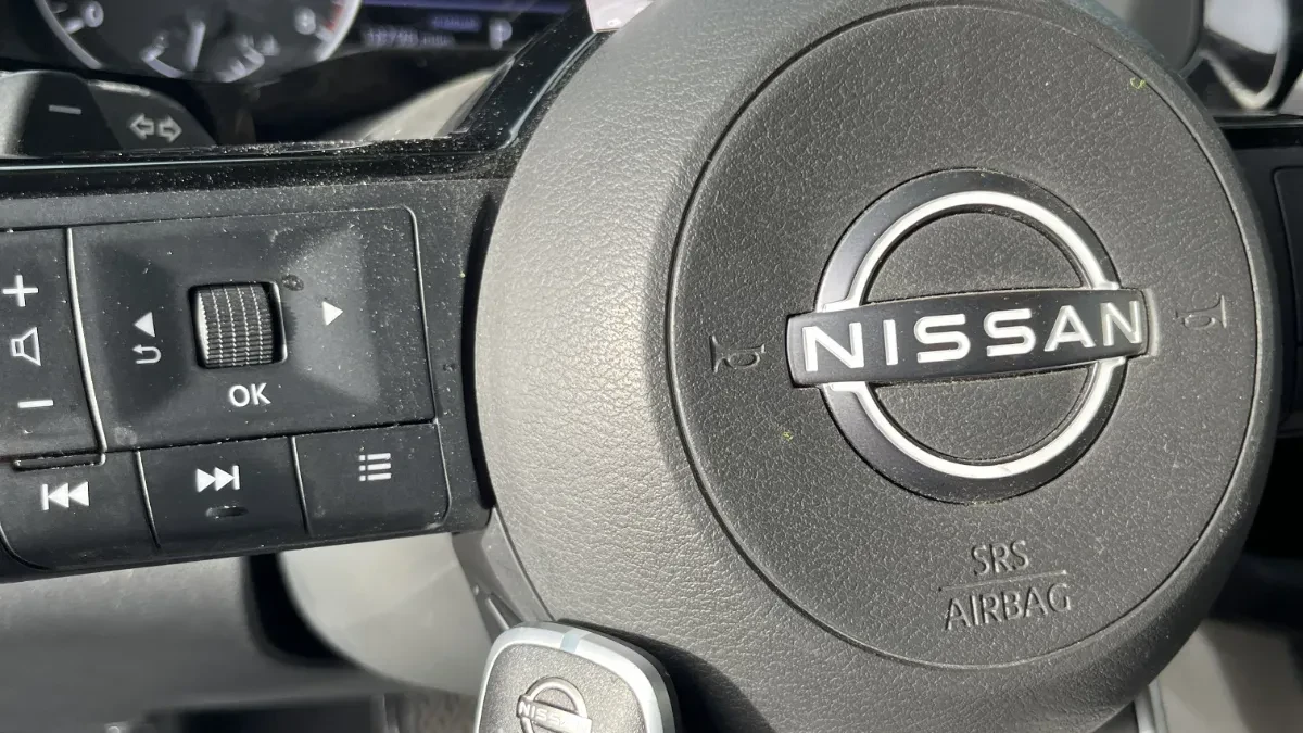 Insured mobile locksmith working on 2016 Nissan Rogue in Rancho Santa Fe CA