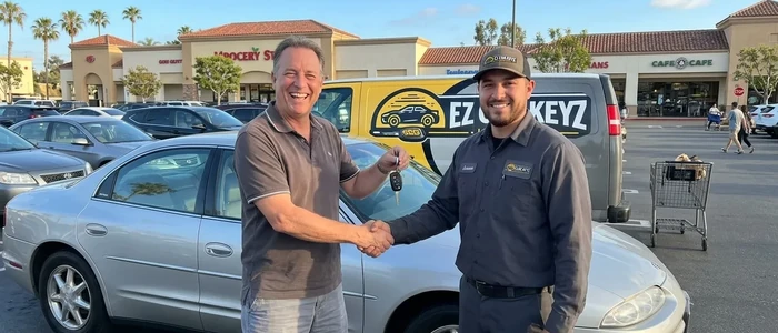 Customer with a replacement Oldsmobile Aurora car key from EZ Car Keyz in San Diego County