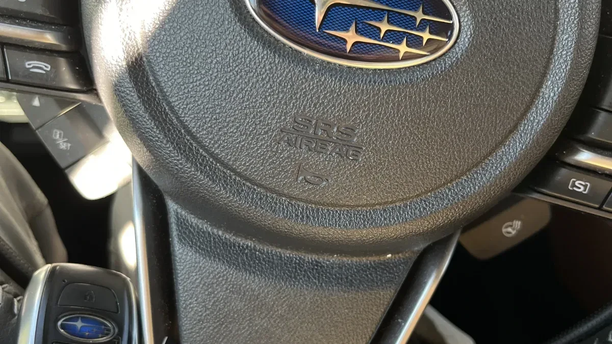 Insured mobile locksmith working on 2004 Subaru Impreza in Oceanside CA