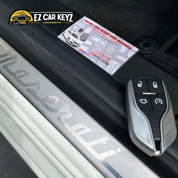 New battery being installed in key fob by EZ Car Keyz in San Diego