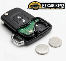 Mobile CR2025 swap on a 2019 Subaru Outback fob at a home in Vista, California. The 2.5-millimeter 160 mAh cell was barely pushing a signal past the bumper. New cell in, full-range function restored. Ten-minute curbside job.