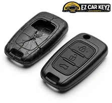 Mobile fob rebuild on a 2018 Chevrolet Silverado at a home in Encinitas, California. The housing cracked from a parking-lot drop, one button pad had gone dead, and the flip blade pivot was bent.