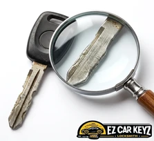Mobile preventive inspection of a 2008 Lexus ES key at a home in El Cajon, California. Magnified inspection showed lateral bend from a heavy keychain and corrosion pitting near the tip.