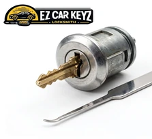 Trunk lock key extraction on a vehicle at a home in San Diego, California. The cylinder sits recessed and inverted, which fights normal gravity-assisted pulls, so we use angled extraction tools and a scope to see the fragment.