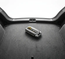 Mobile trunk lockout on a 2019 Nissan Sentra at a parking structure in Spring Valley, California. The fob trunk button and manual cylinder both failed, so we opened the driver's door non-destructively and reached the trunk through the cabin release.