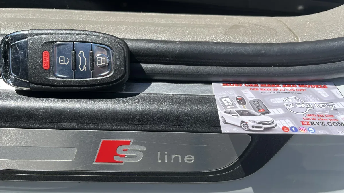Insured mobile locksmith working on 2011 Audi A8 in Oxnard CA