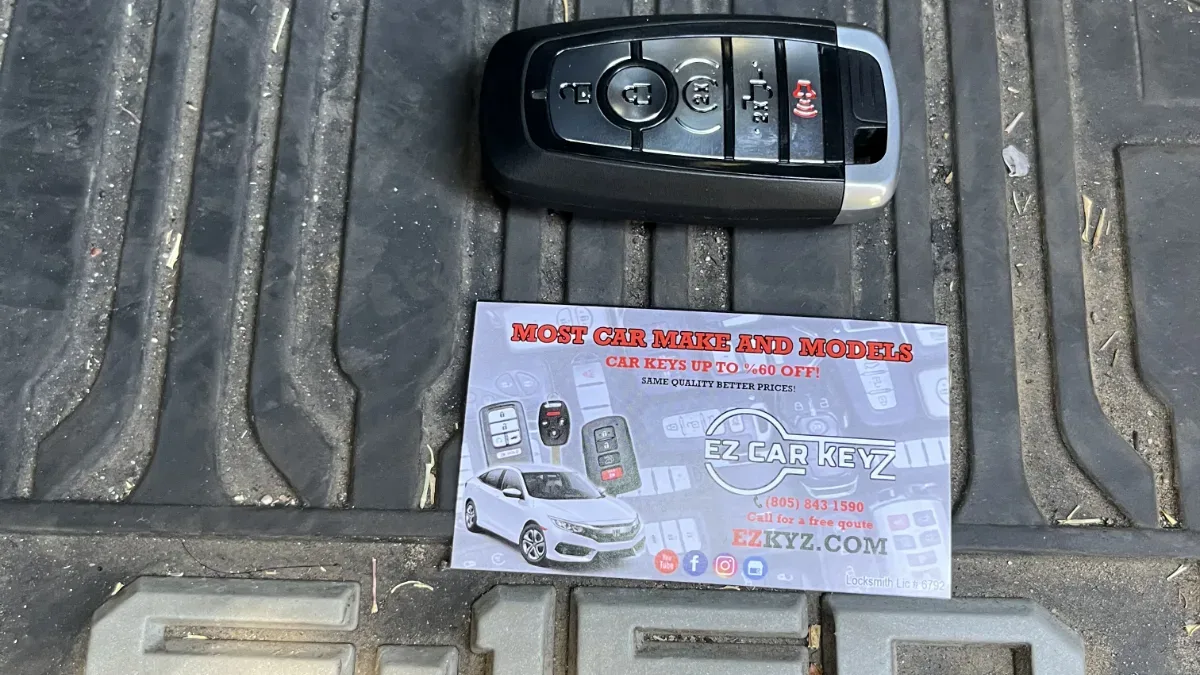 2013 Ford Escape Affordable Key Replacement - EZ Car Keyz Ventura Insured mobile locksmith working on 2013 Ford Escape in Ventura CA