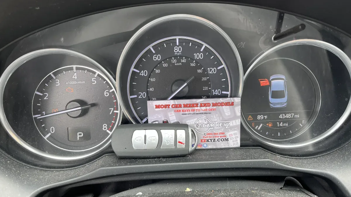 Insured mobile locksmith working on 2014 Mazda 6 in Ventura CA