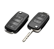 Flip key duplication for a 2017 Chevrolet Cruze at a driveway in Ventura, California. A fresh housing is loaded with a cut blade, the transponder chip is cloned, and the remote frequency is paired in the same visit.