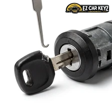 Ignition key extraction on a 2013 Ford Focus at a home in Oxnard, California. The wafers were clamping the broken fragment tight, so specialized extraction hooks are guided down the keyway rather than risking bent wafers with pliers.