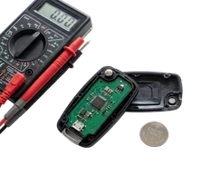 Smart-key diagnostics on a 2018 Honda CR-V at a driveway in Santa Paula, California. A frequency counter verified the fob was transmitting cleanly on 315 MHz, but the low-frequency antenna in the driver's door handle wasn't receiving.