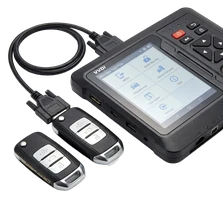 Smart key system reprogramming on a 2017 Nissan Murano at a driveway in Port Hueneme, California, after a dead 12-volt battery dropped the fob pairing table. The fobs themselves are fine, the system just lost sync.